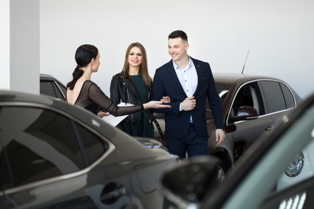 auto business car sales a happy couple with a c 2025 01 10 20 38 15 utc